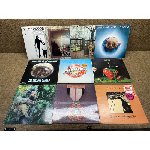 1181 - 10 1960/1980 vinyl L.P albums including Fleetwood Mac , Rolling Stones and ELO.