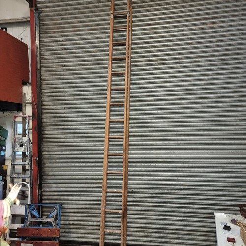 241 - Two tier tall wooden step ladders.