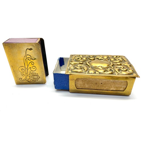 654 - Two brass vintage Matchbox engraved boxes . Largest 8 x 6 cm.