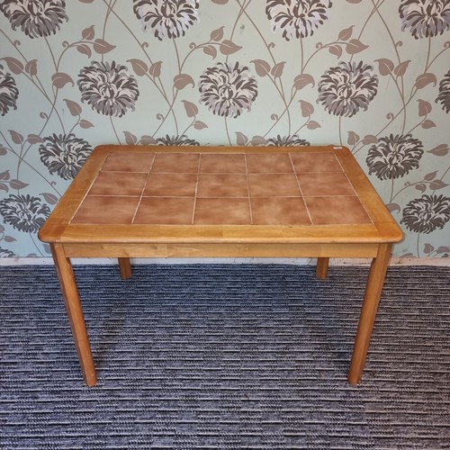 1072 - Pine table, 116cm L X 75w x 75. (legs unscrew for transport).