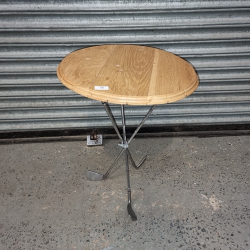 56 - Side table with golf club legs.
