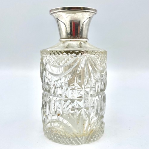 855 - Cut crystal scent bottle with silver silver cap and original stopper, by Ahronsberg Brothers