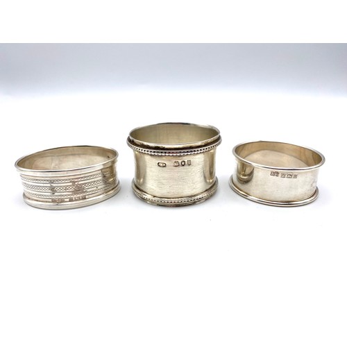 865 - Three Stirling silver napkin rings. 53g