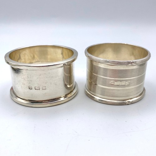 866 - Two Stirling silver napkin rings 68g: Left hallmarked Birmingham 1912, Right hallmark unreadable.