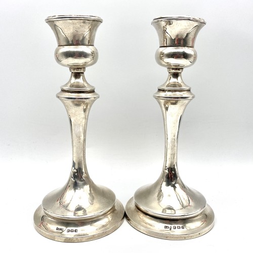871 - Pair of Stirling silver candle sticks. Birmingham 1919 by Spurrier & Co. 17cm high.