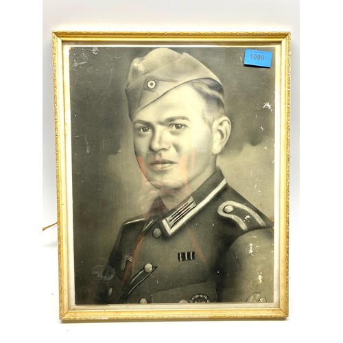 1099 - Framed original photograph of a German officer with details to the rear dated 1941.