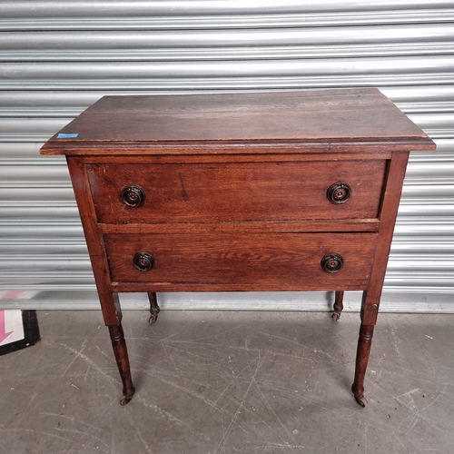 1130 - Dark oak Edwardian two drawer set of drawers.