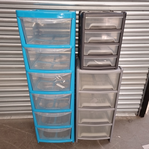 148 - Three sets of plastic storage drawers.