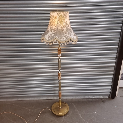 155 - Brass and onyx tall standing lamp.