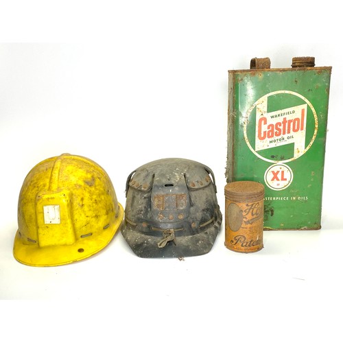 1137 - Vintage Castrol oil can, Holdtite innertube can and two vintage mining helmets.