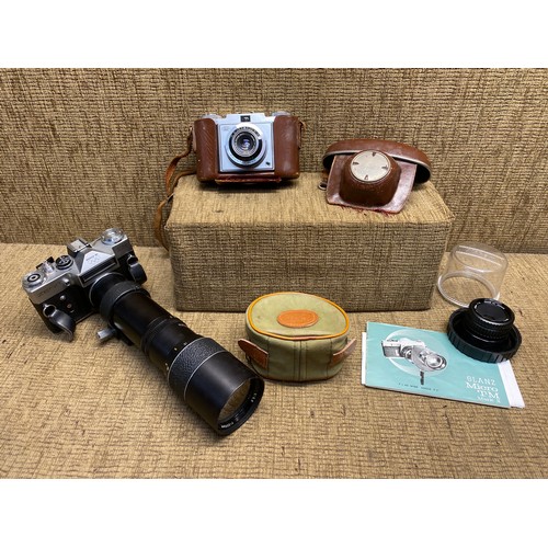 1143 - Two cameras and lenses including Zeiss ikon and Zenit EM with a optomax 300mm lens and Nikon 50mm le... 