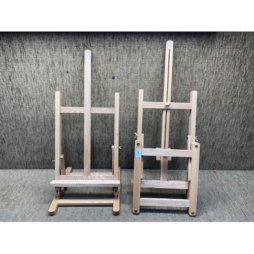 181 - Two wooden folding artists easels.