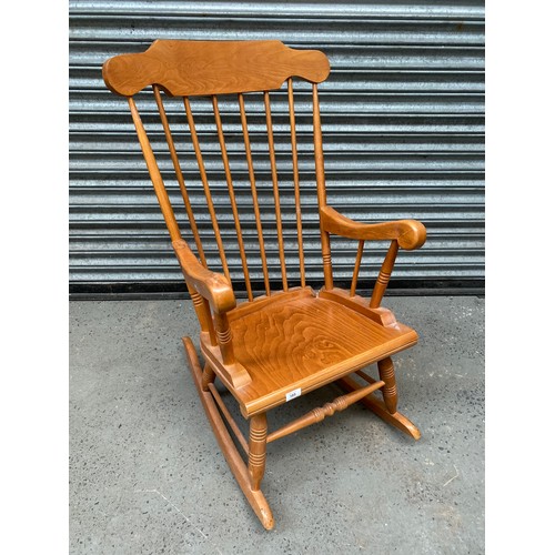 185 - Mid-century tall backed pine rocking chair.