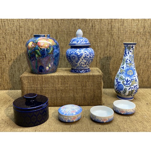 1155 - collectable ceramics including: A handcrafted blue floral vase; height 21cm and a byzanta ware vase.