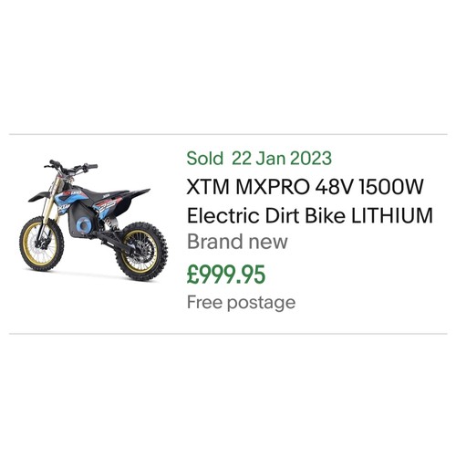 6 - XTM Electric off road dirt bike with power cable, owners manual and keys.