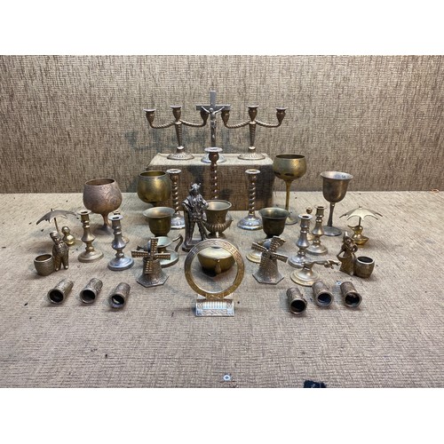 501 - Large collection of glass items including: candle holders, figurines and goblets.