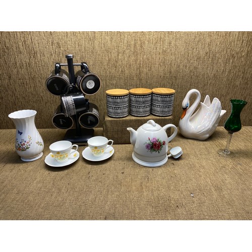 243 - Ceramic and household items including urban paradise tea set , two Hudson Hopkins daffodil cup + sau... 