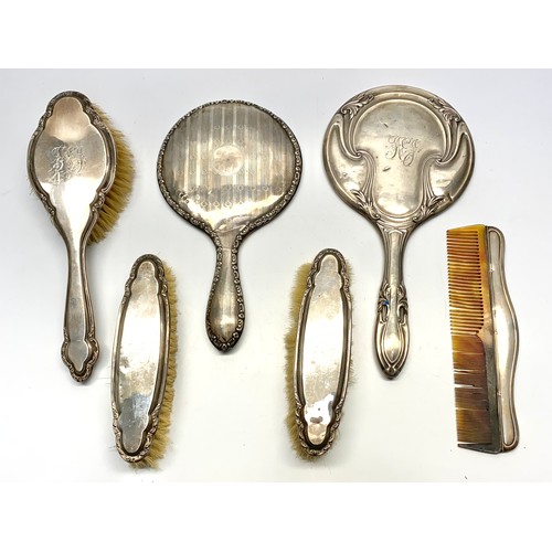 885 - Silver dressing table set hallmarked Birmingham by S.Blanckensee and son dated 1920.