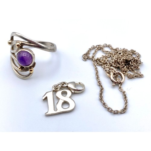 877 - Silver ring size J, Silver chain and silver 18 charm.