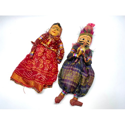 722 - Two authentic Indian hand crafted puppets.