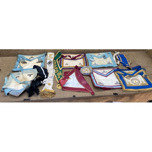 514 - Large quantity of Masonic aprons and regalia.