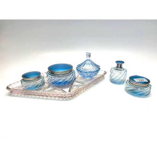 747 - Glass dressing table set with Guilloche lids.