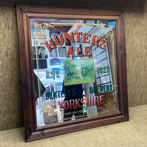 1232 - Hunters ale Bentleys brewery framed advertising mirror.

Size: 74cm x 68cm.