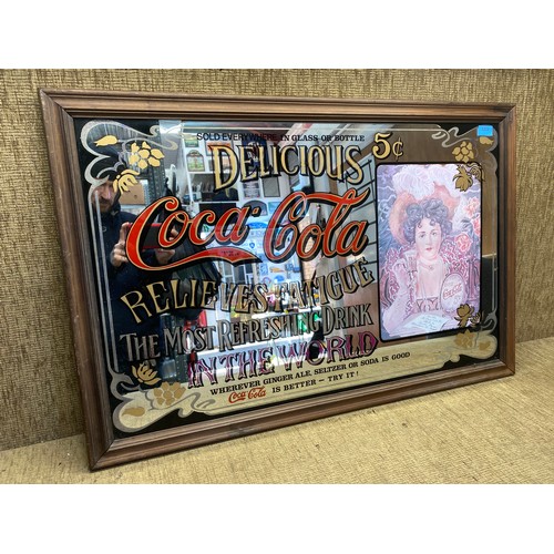 1234 - Vintage Coca cola large framed advertising mirror.

Size: 95cm x 63cm.