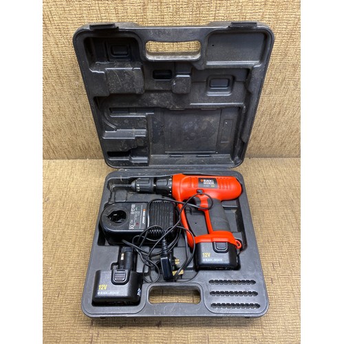 325 - Black and Decker 12 cordless drill with charger.