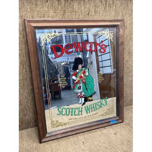 1238 - Dewar's scotch whiskey mirror advertisement.

Size: 50cm x 60cm.