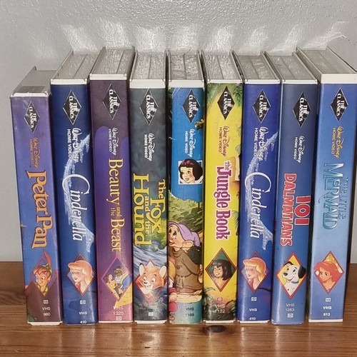 1107A - Collection of Original Disney Black diamond Big box Rental VHS films including The Jungle Book, The ... 