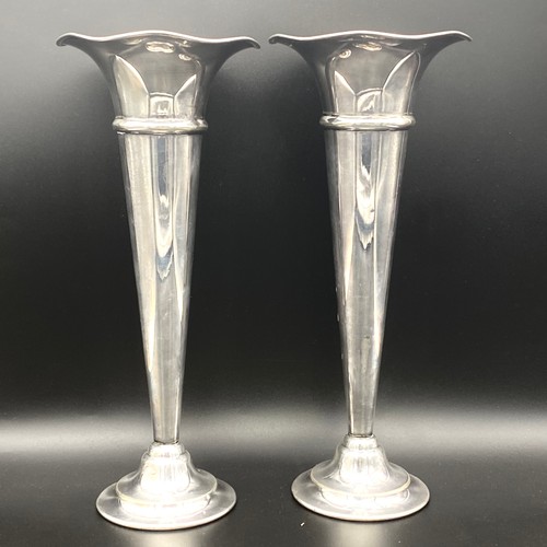 866 - Pair of tall Mappin and Webb princes plate triple deposit flute vases. 28cm.