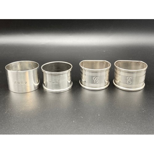 870 - Four sterling silver with hallmarks napkin rings. 85g