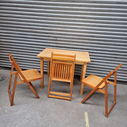 114 - Pine wood dining table with 3 pine wood dining chairs.