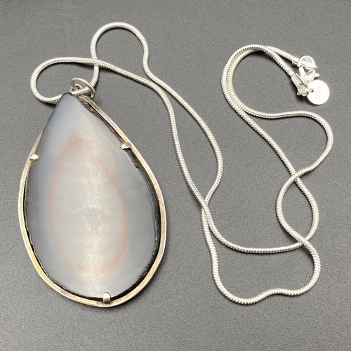 889 - Silver necklace and large agate with silver framed handmade pendant.