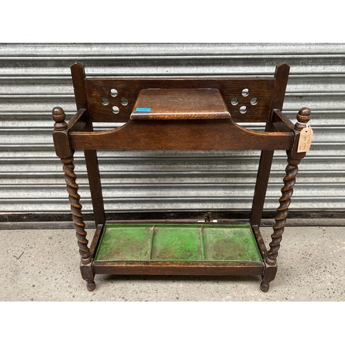 1174 - Victorian style Oakwood cane and umbrella stand with barley twist features.