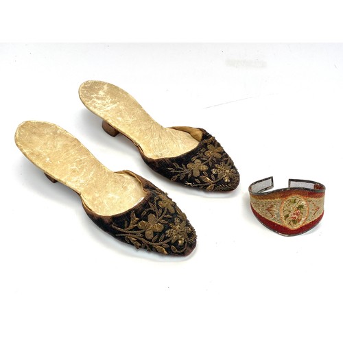 743 - Pair of handcrafted and embroiled antique women's shoes and wrist embroidery.