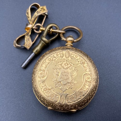 897 - 18ct gold ladies pocket watch 33.5g with movement, 4.5cm (working) with one key and fob bow.