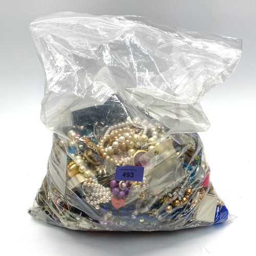 493 - 5.6 KG of costume jewellery.