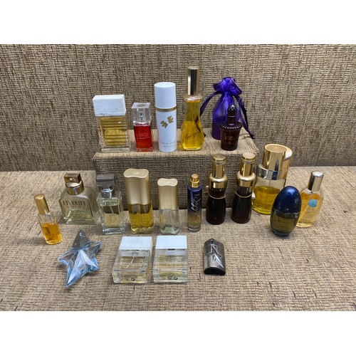 472 - Large selection of womens perfume including: Giorgio beverly hills and guerlain paris.