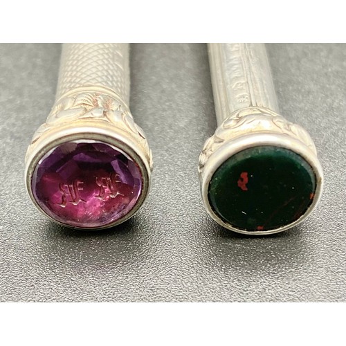 937 - Two sterling silver propelling pencils with semi-precious stones, blood stone.