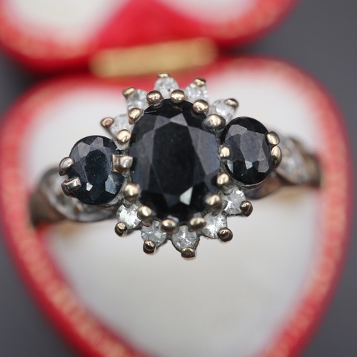 950 - 9ct gold cluster ring with black diamonds. 4g size S.