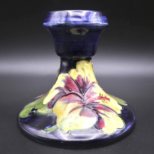 957 - Moorcroft hibiscus blue candle holder. 9cm.