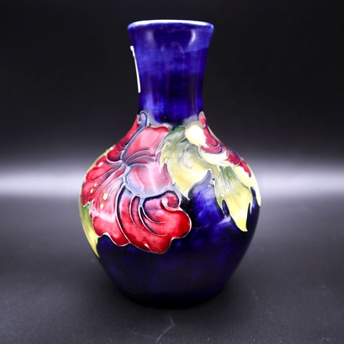 958 - Moorcroft hibiscus blue vase 13cm.