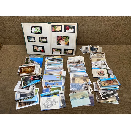 1203 - Scrap book and postcards.