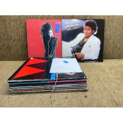 1230 - Vinyl record albums including: Michael Jackson, Super Tramp and Janet Jackson.