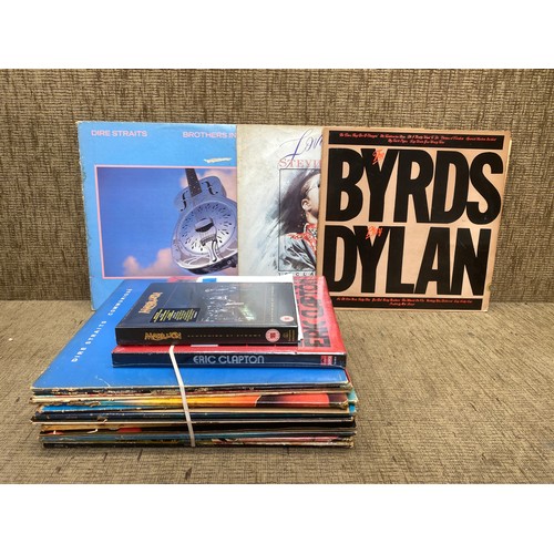 1238 - Selection of 20 vinyls including: Dire Straits, Stevie Wonder and The Byrds.