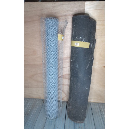 255 - Two large rolls of chicken wire and bitumen.