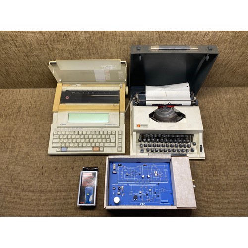 1200A - Selection of vintage items including: Canon StarWriter 30-II and a Olympiette portable type writer.