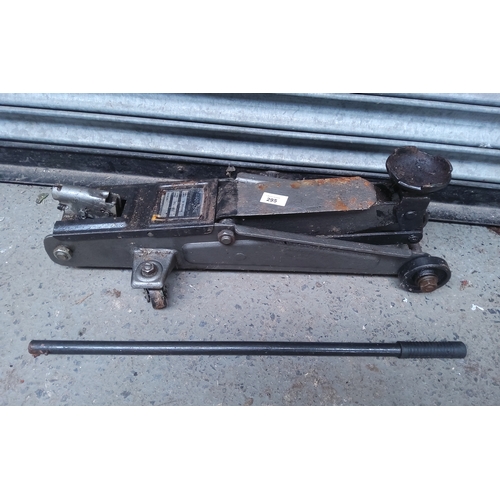 295 - A quality 4400lbs (2TON) trolley jack and handle.